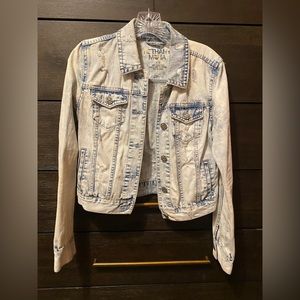 Acid wash, distressed denim jacket. Size medium.